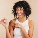 Cheerful woman choosing the copper IUD for contraception