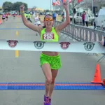 Trisha Stavinoha finishing a race
