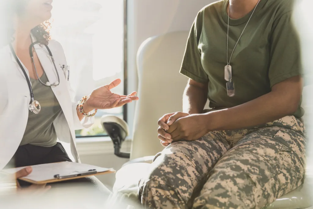 Female veteran receives bad news from doctor