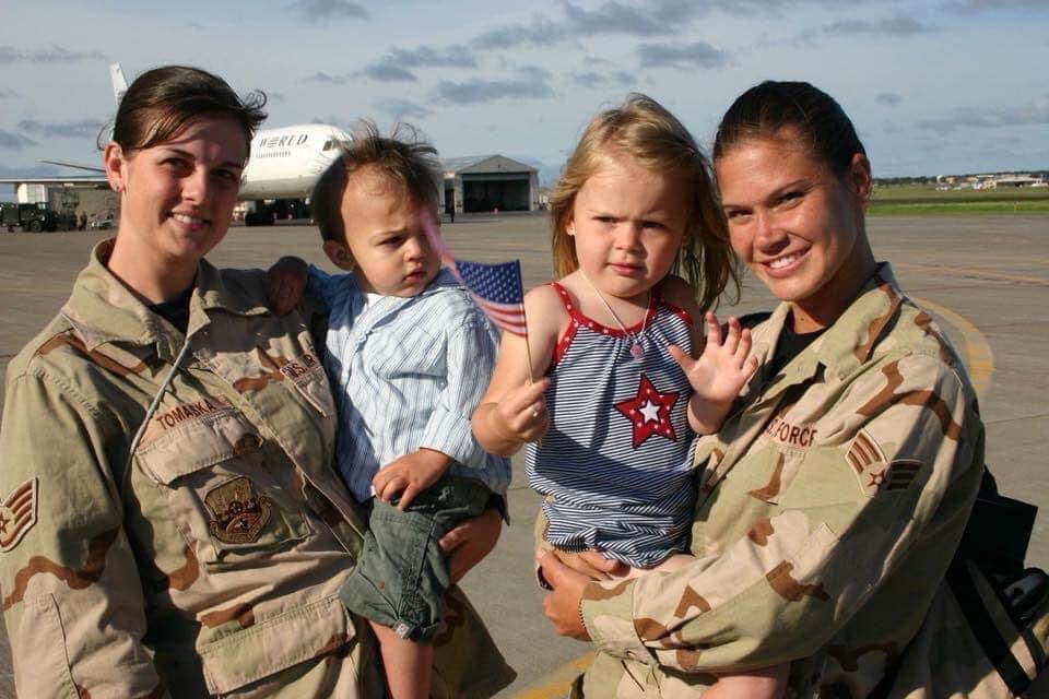 Julie (left) with her son and Amie with her daughter, 2005